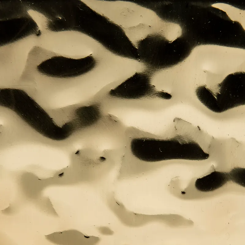 Brass swatch: hammered water drop polished